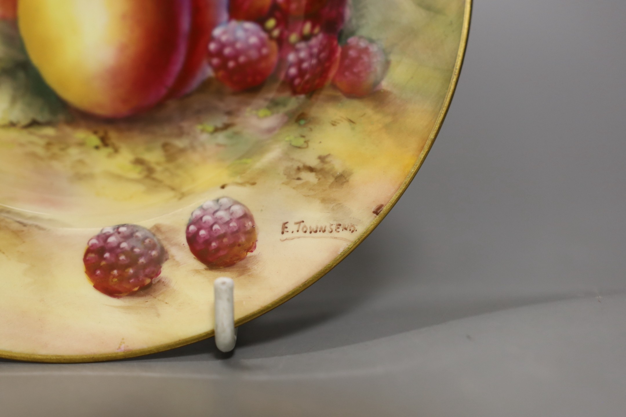 Two Royal Worcester fruit painted small plates, signed R. Townsend - 15.5cm diameter